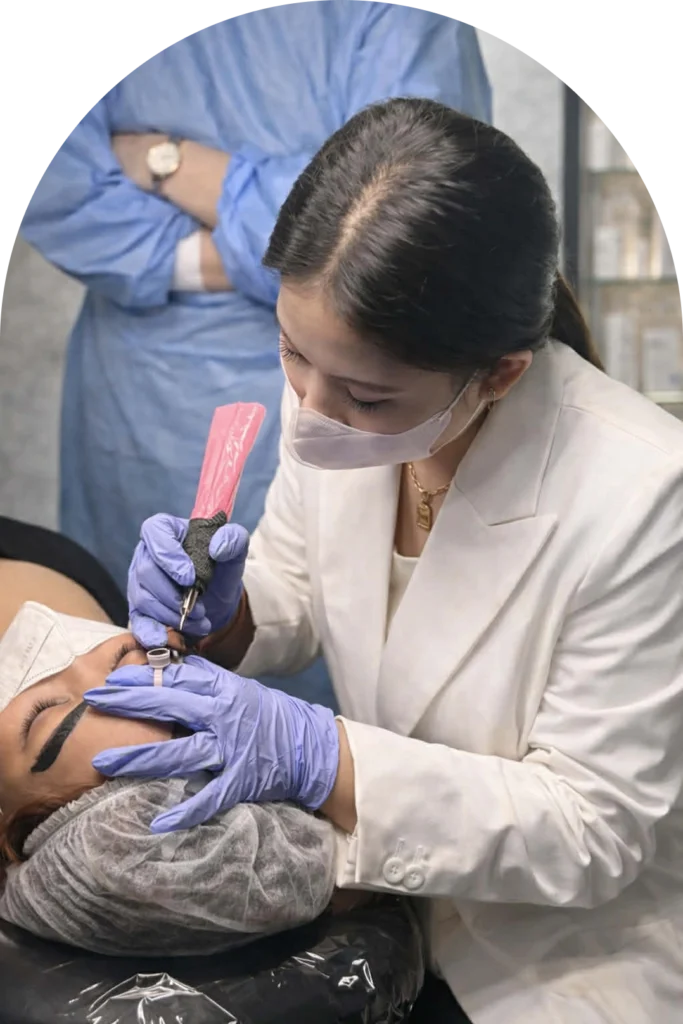 International SPMU Master Trainer Divine Grace Alecha demonstrating advanced brow technique during a live training programme in Cebu, Philippines